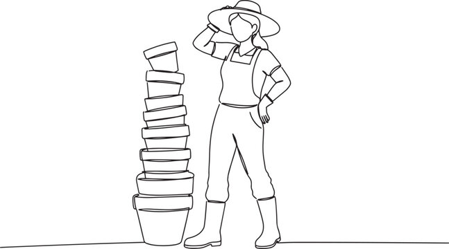 Gardener woman standing next to a stack of empty flower pots.