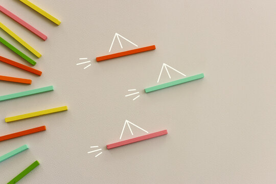 Concept image of wooden cube and boat metaphor. Idea of leadership and education