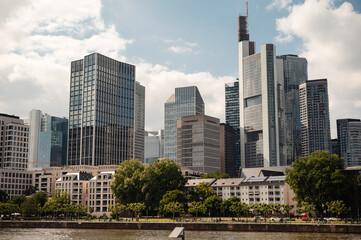 Fototapeta premium Frankfurt skyline with modern skyscrapers and the Main River in the foreground