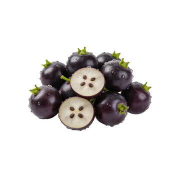 A pile of fresh purple star apples, one cut in half, showing its white flesh and seeds