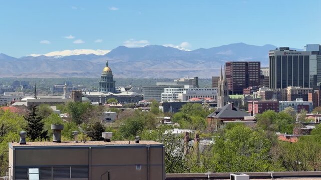 Colorado State Capitol in Denver with Rocky Mountains in the background