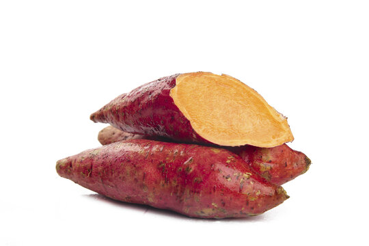 Fresh Red Sweet Potatoes with Slice on White Background