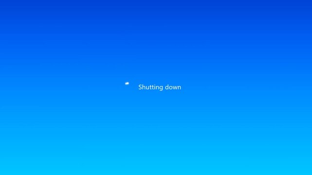 Computer operating system shutting down screen with loading spinner on blue background animation