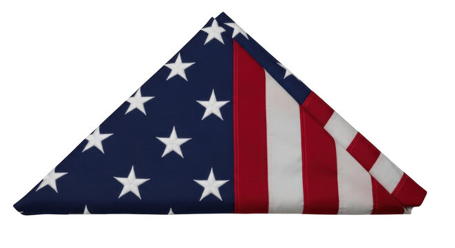 A triangular folded american flag with white stars on a blue field and red and white stripes, isolated on a solid black background