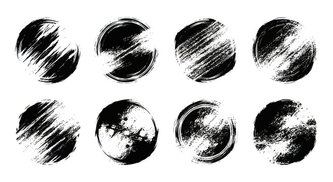 Set of eight black grunge ink circles with brush strokes.