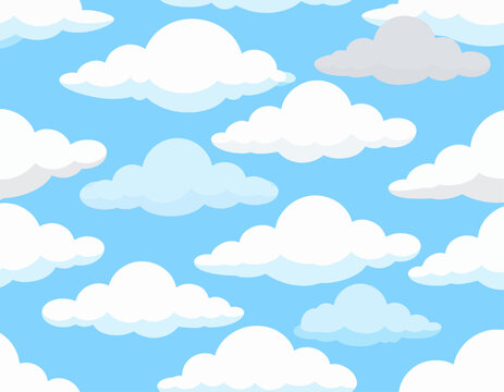 Fluffy white and grey clouds drift across a bright blue sky