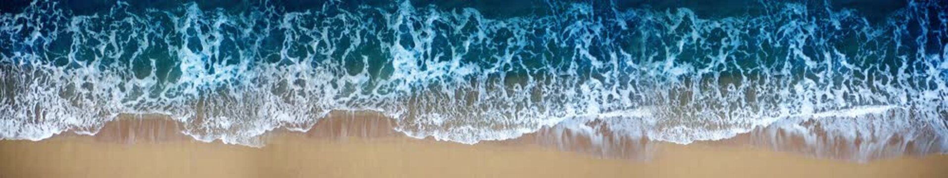 Aerial Top View of Ocean Wave Breaking on Sandy Beach with White Sea Foam &mdash; Wide Panoramic Loop