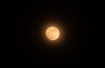 An extremely rare "Blue Micromoon" is visible. This is the second full moon of May, and it coincides with a micromoon  the moon is at its farthest point from Earth in its orbit for the entire year. © Soumyabrata