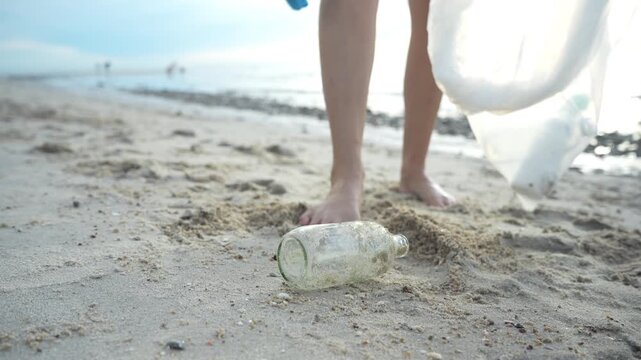 Save ocean. Volunteer pick up trash garbage at the beach and plastic bottles are difficult decompose prevent harm aquatic life. Earth, Environment, Greening planet, reduce global warming, Save world