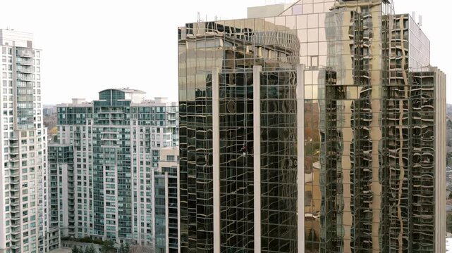 Surface distortions and repetitive designs emphasize artistic craftsmanship of architectural facades