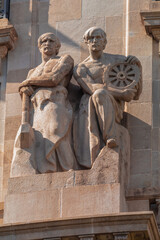 Fototapeta premium On the streets in Barcelona, public places. Elements of architectural decorations of buildings, sculptures, mythological and religious characters. 