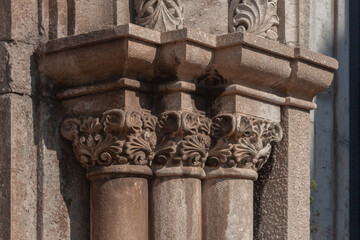 elements of architectural decorations of buildings, columns, pommel and patterns, on the streets in Barcelona, public places. © Kozlik_mozlik