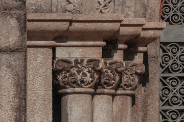 elements of architectural decorations of buildings, columns, pommel and patterns, on the streets in Barcelona, public places. © Kozlik_mozlik