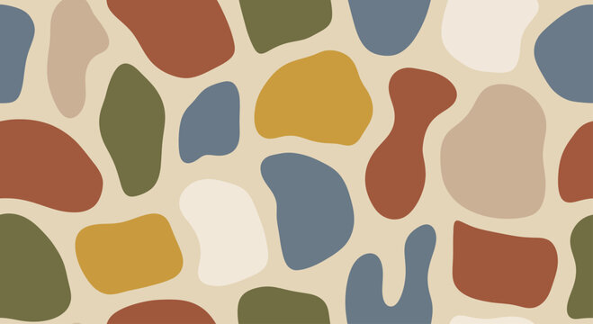 Abstract organic shapes in earthy tones seamless pattern.