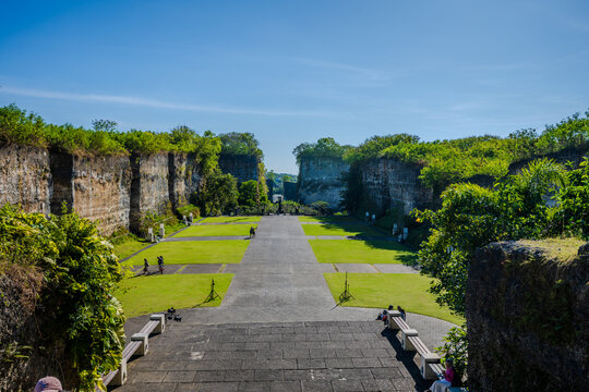 Garuda Wisnu Kencana Cultural Park featuring limestone cliffs and central plaza