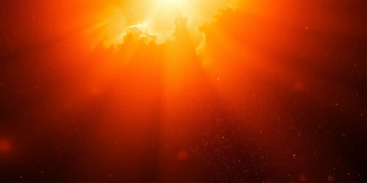 Blazing sunburst illuminates the sky with intense rays, creating a dramatic and fiery spectacle.