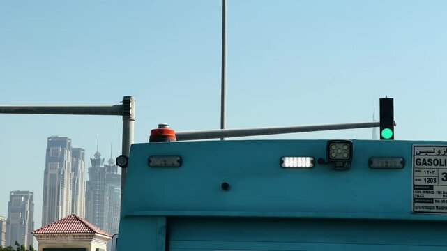 Dubai, Uae - Jan 05, 2025: Emergency reflective flashing lights on a modern gas service truck in the urban skyline of Dubai, UAE