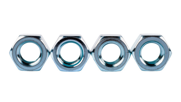 Four Hexagonal Metal Nuts Lined Up