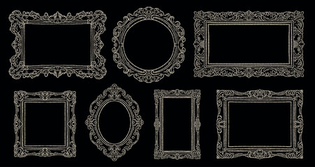 Hand drawn elegant vintage baroque picture frames illustration set. Luxury doodle sketch of classic museum mirrors and antique gold ornate borders. Vector isolated on black background chalkboard style © curly