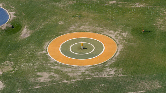 Aerial view of the circular target at Chi Chi - The Golf Venue with concentric rings on a green grass field in Utrecht, Utrecht, Netherlands.