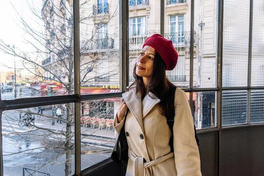 Woman admiring bir hakeim bridge cityscape in paris