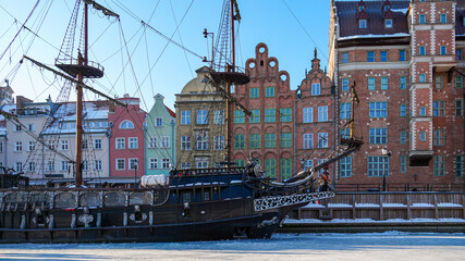 Historic Gdańsk Waterfront with Old Architecture, Decorative Facades and Ship View © uladzimir