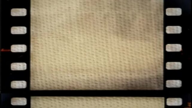 Vintage textured paper background enclosed in an old black film frame layout with analog scratches abstract cinematic background video editing motion graphics footages clip assets footage.