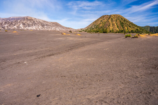 The Sea of Sand with Mount Bromo and Mount Batok in Indonesia