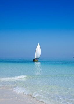 Dhow on turquoise water, Nampula Province, Island of Mozambique, Mozambique