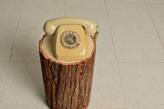 an old telephone with rotary dial