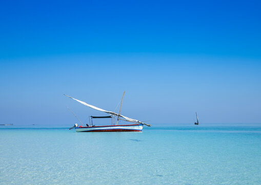 Dhow on turquoise water, Nampula Province, Island of Mozambique, Mozambique