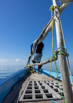 Man sailing on a dhow, Nampula Province, Island of Mozambique, Mozambique