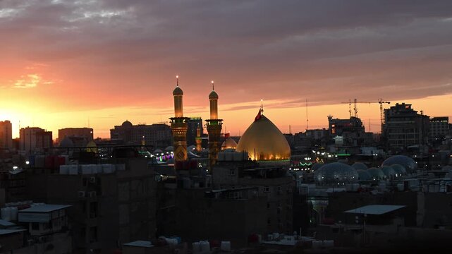 Karbala, Iraq - December 28, 2025: Aerial footage of golden dome of Shrine imam Hussain in Karbala city , Iraq