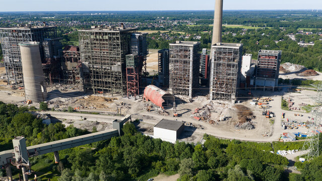 Aerial view of the Kraftwerk Voerde power plant under demolition with industrial structures and debris in Voerde, North Rhine-Westphalia, Germany.