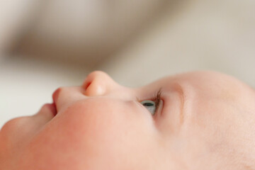 Profile Portrait of a Beautiful Blue-Eyed Baby © andrey