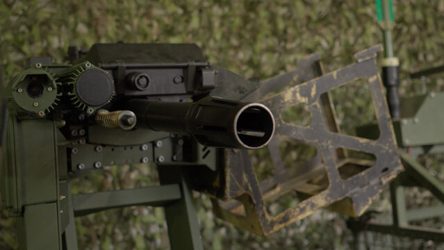 A high-quality image of an unmanned ground combat vehicle in a secure facility. Representing the next generation of war, this UGV highlights the shift toward robotic and autonomous systems in global d