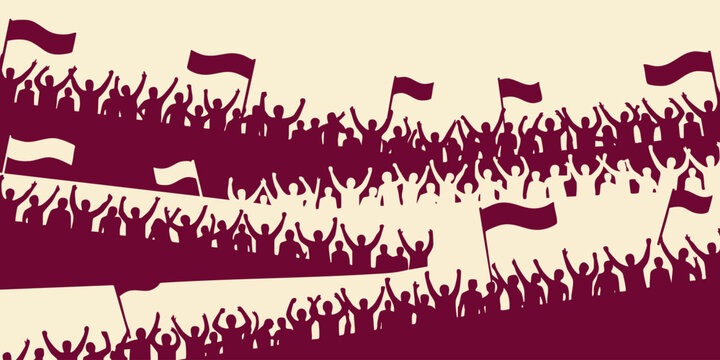 A large crowd of people wave flags enthusiastically at an outdoor sports event in a stadium.