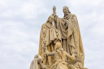 Obraz premium Historic stone statue of Saints Cyril and Methodius on Charles Bridge.