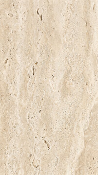Natural beige travertine stone texture background with porous details