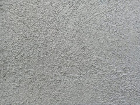Close Up Seamless Texture of Rough Grey Stucco Plaster Wall Surface Background