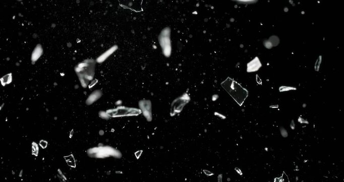 This impressive and stunning glass shatter sequence showcases pieces scattering dramatically across a rich black backdrop, making it perfect for enhancing motion graphics and visual effects projects