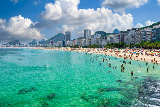 View of Copacabana beach and Leme beach in Rio de Janeiro, Brazil. Copacabana beach is the most famous beach of Rio de Janeiro, Brazil. Sunny cityscape of Rio de Janeiro.