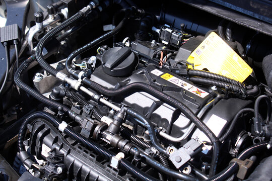 Vinnytsia, Ukraine; May 23, 2026. Mini Cooper Clubman 2018 engine 1.5 turbo with hood up. Mini Cooper engine cover. Mini Cooper gas engine. Close up of car engine parts under hood. Сomplex modern car 
