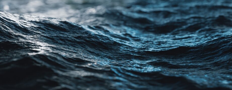 Dark ocean waves close up at night, dramatic sea surface texture background