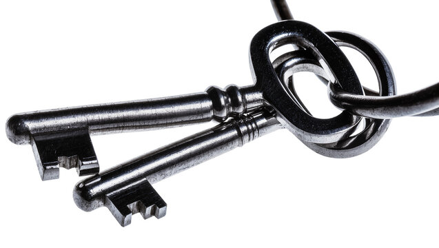 Two antique metal keys linked together