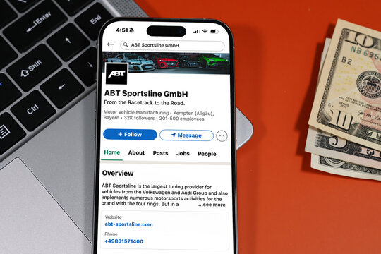 Kiel, Germany - 05-20-2026: ABT Sportsline German automotive tuning and motorsport company Profile on LinkedIn displayed in a workspace enviroment with laptop