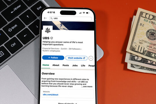 Kiel, Germany - 05-20-2026: UBS Swiss global financial services and investment banking company Profile on LinkedIn displayed in a workspace enviroment with laptop