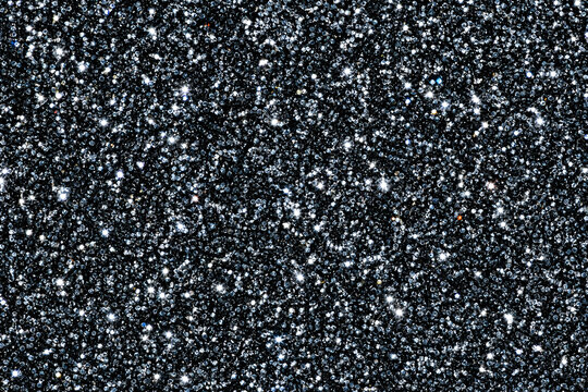 Silver glitter texture luxury shimmering dark background