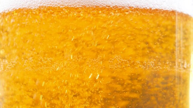 Beer in a glass. The drink is poured into the glass.