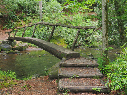 The Simple Old Fashion Tree Bridge Over the Oconalutee River in Smokemont Campground North Carolina